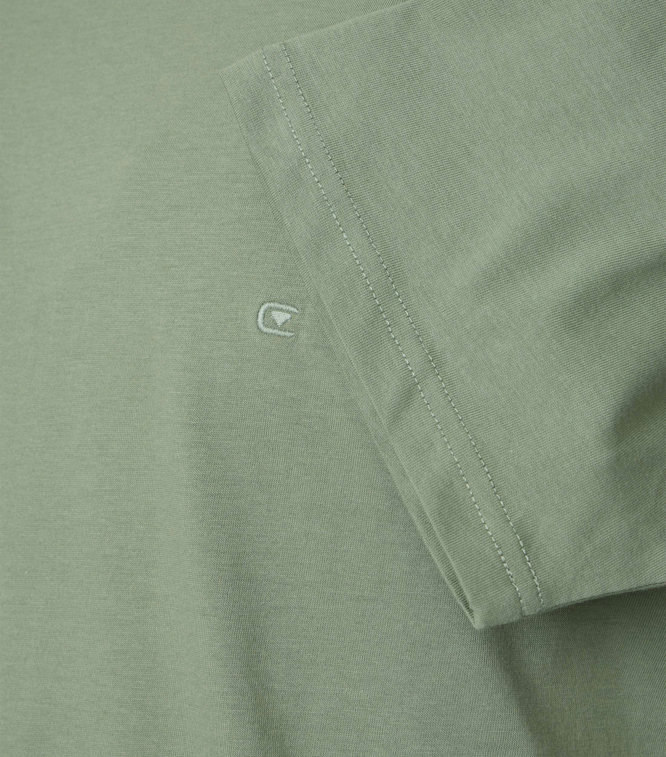 Ein T-Shirt im uni Muster in der Farbe Türkis