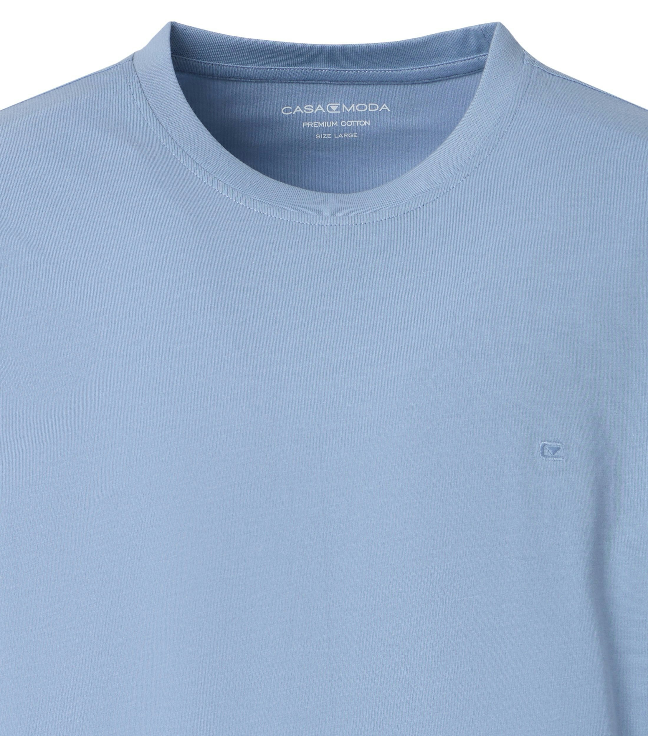 Ein T-Shirt im uni Muster in der Farbe dunkles Mittelblau