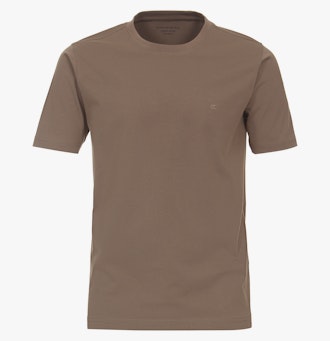 Das Model trägt ein TShirt im uni Muster in der Farbe Beige
