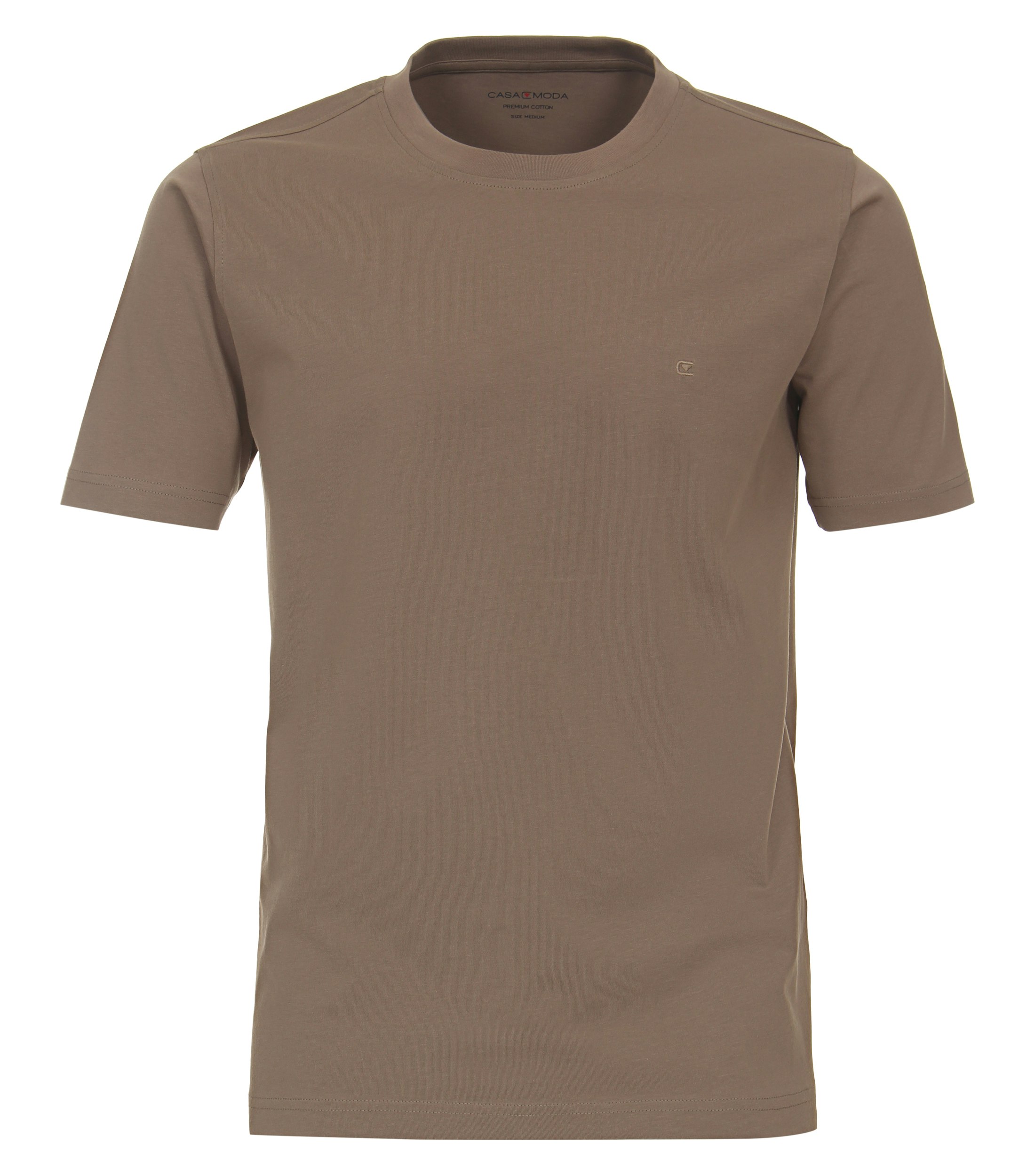 Das Model trägt ein TShirt im uni Muster in der Farbe Beige