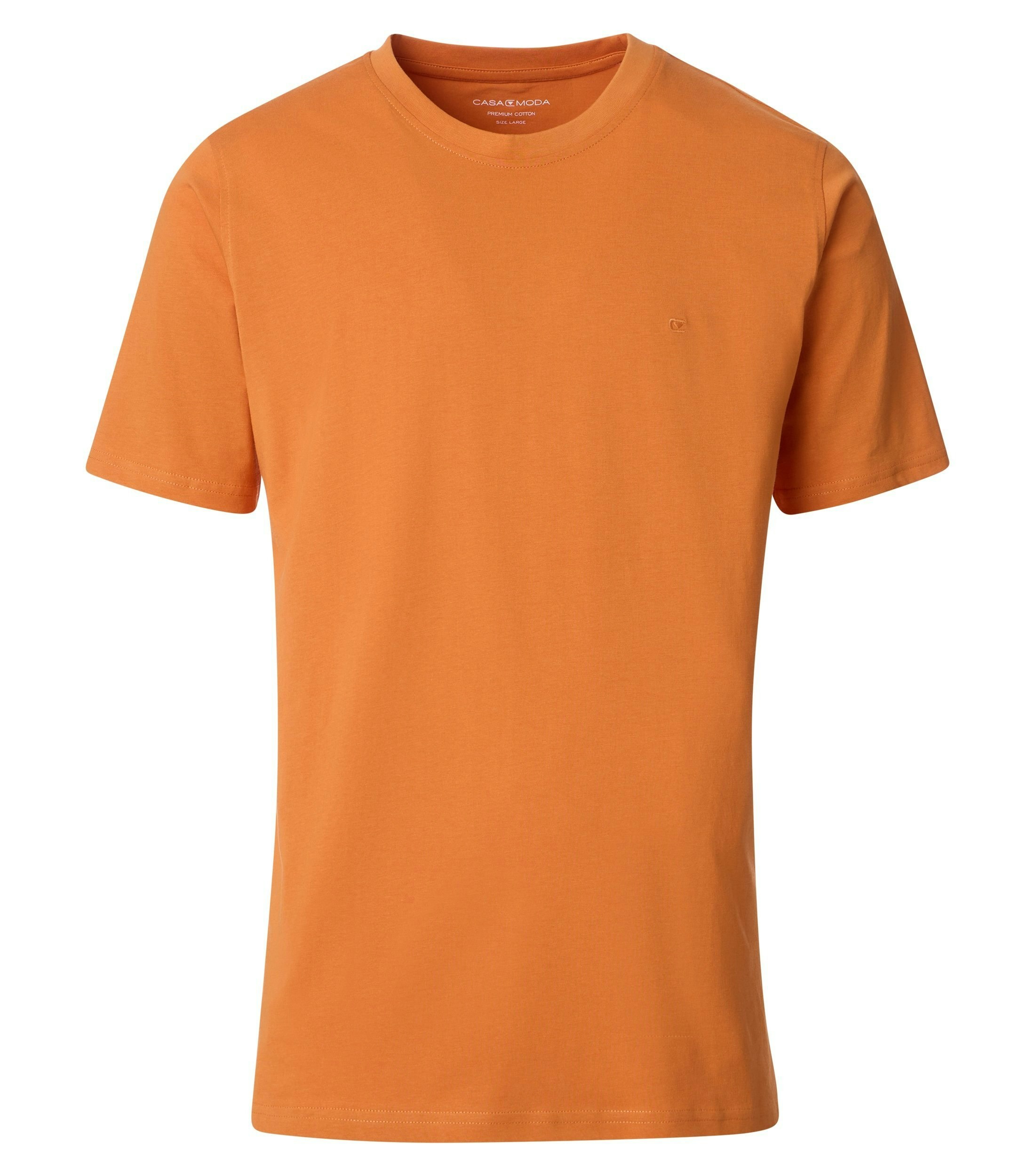 Das Model trägt ein TShirt im uni Muster in der Farbe  Orange