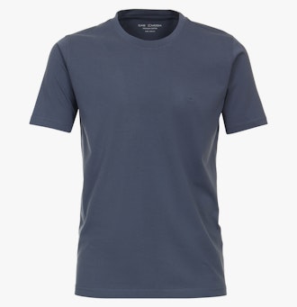 Das Model trägt ein TShirt im uni Muster in der Farbe Aquadunkelblau