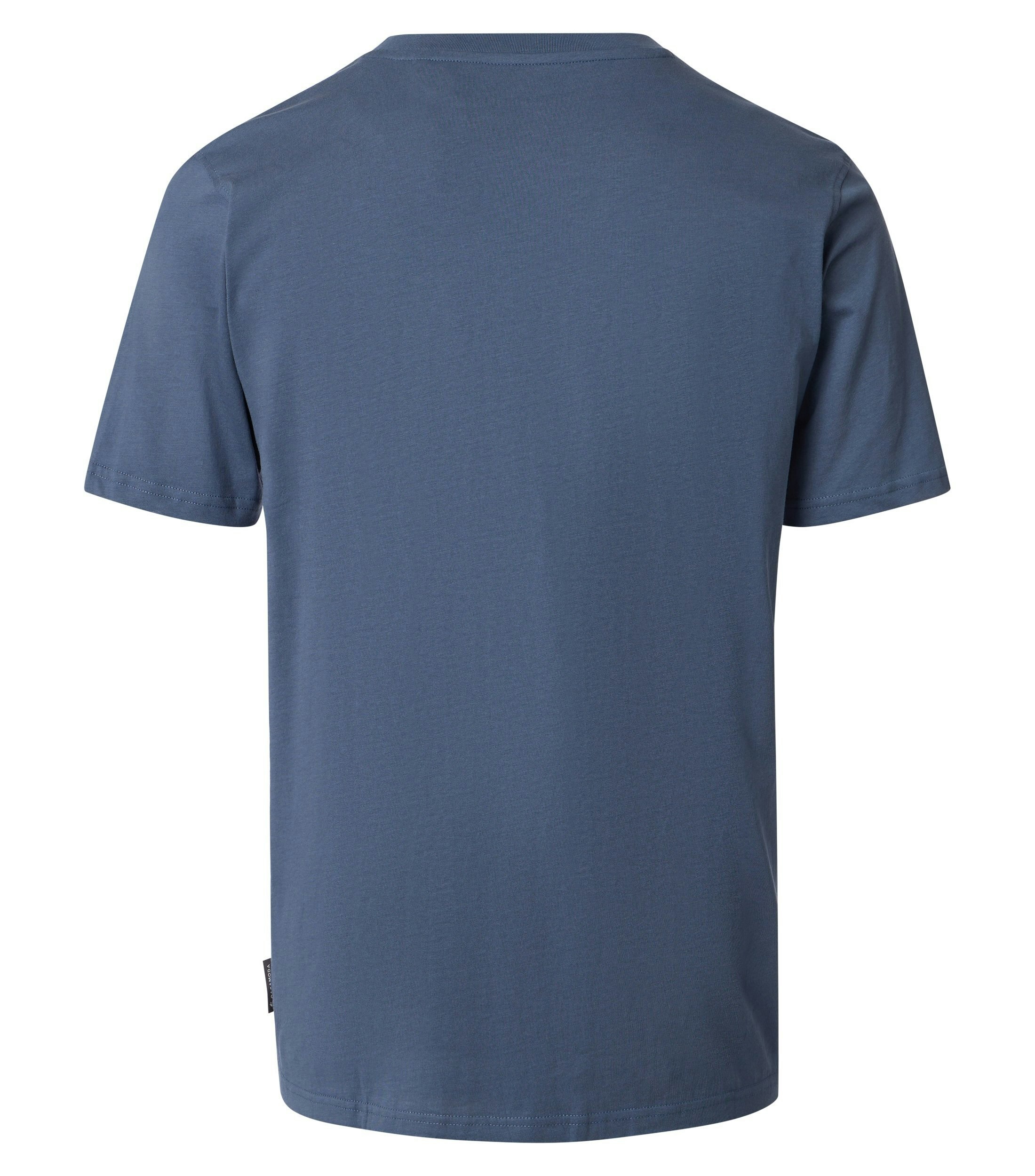 Das Model trägt ein TShirt im uni Muster in der Farbe Aquadunkelblau