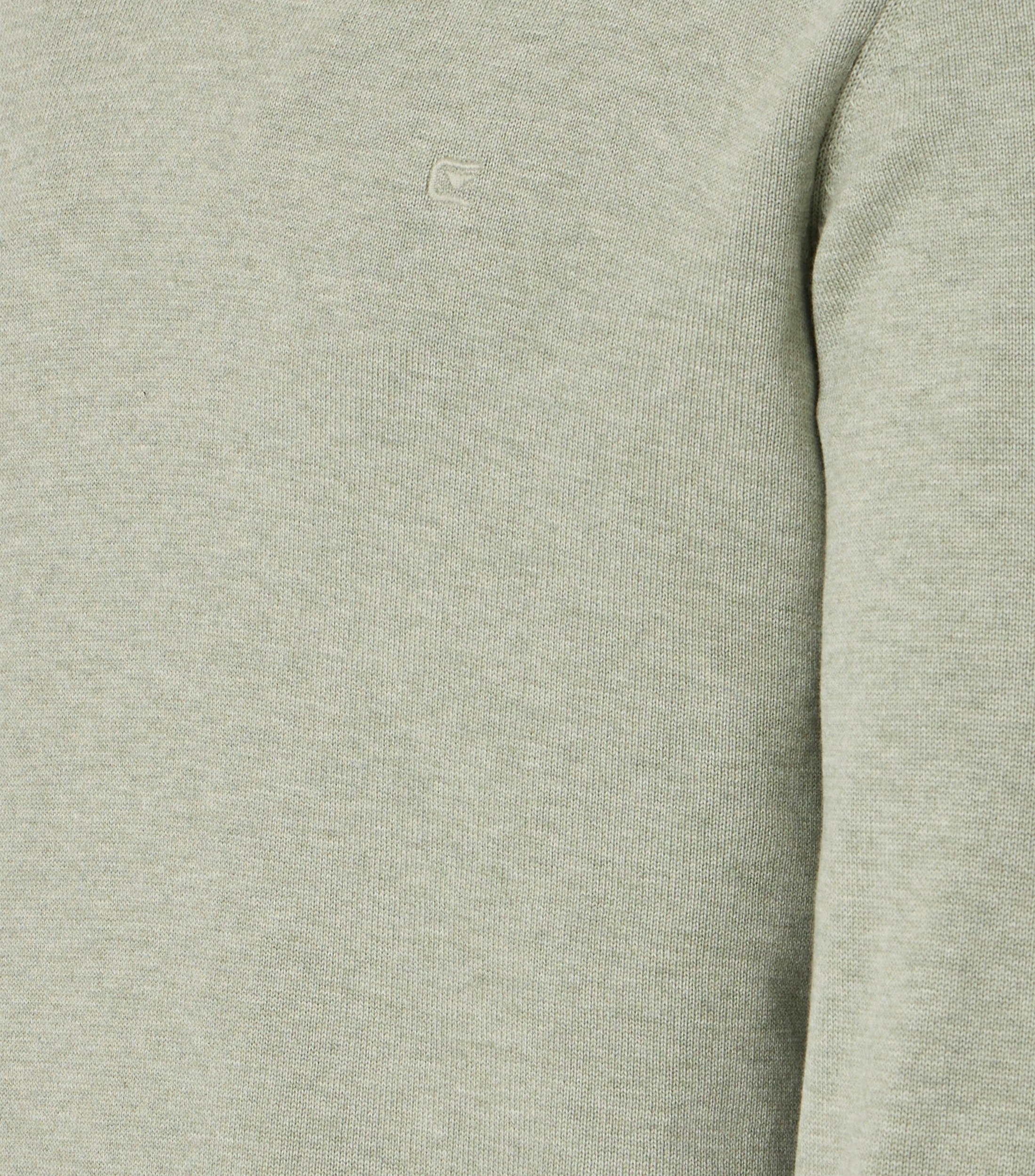 Ein Pullover im uni Muster in der Farbe Helltürkis