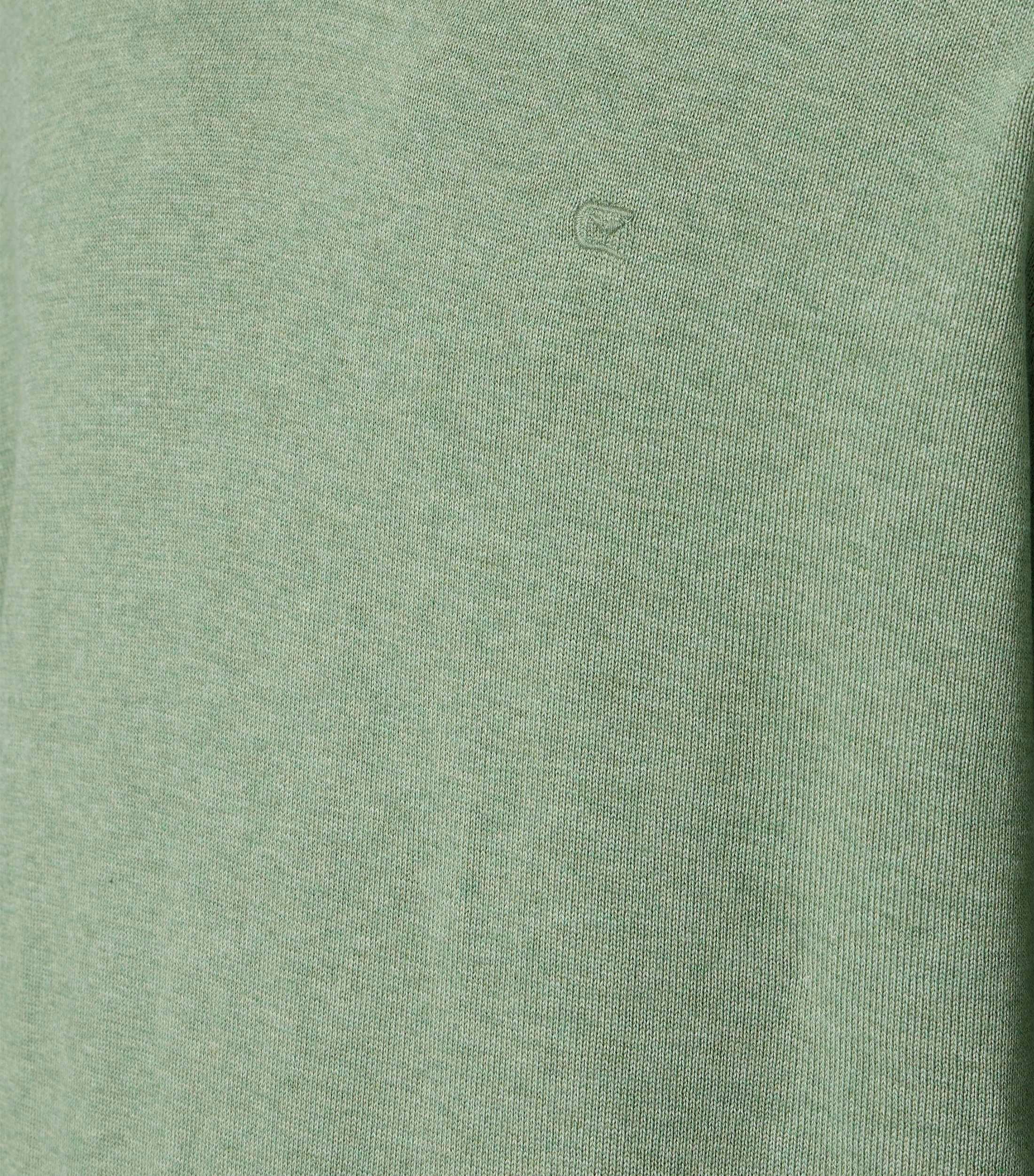 Ein Pullover im uni Muster in der Farbe Türkis
