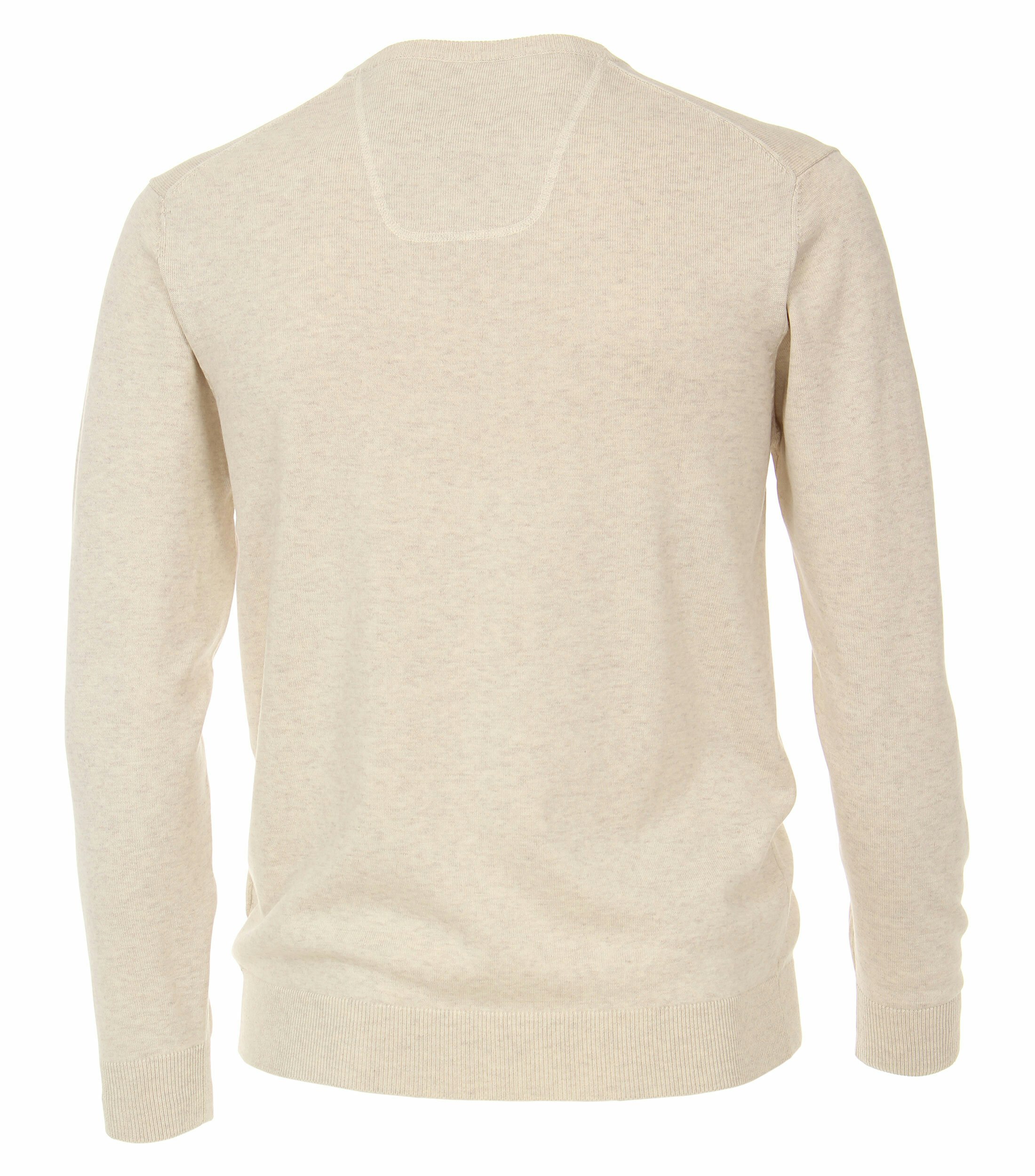 Das Model trägt ein Pullover im uni Muster in der Farbe Champagner