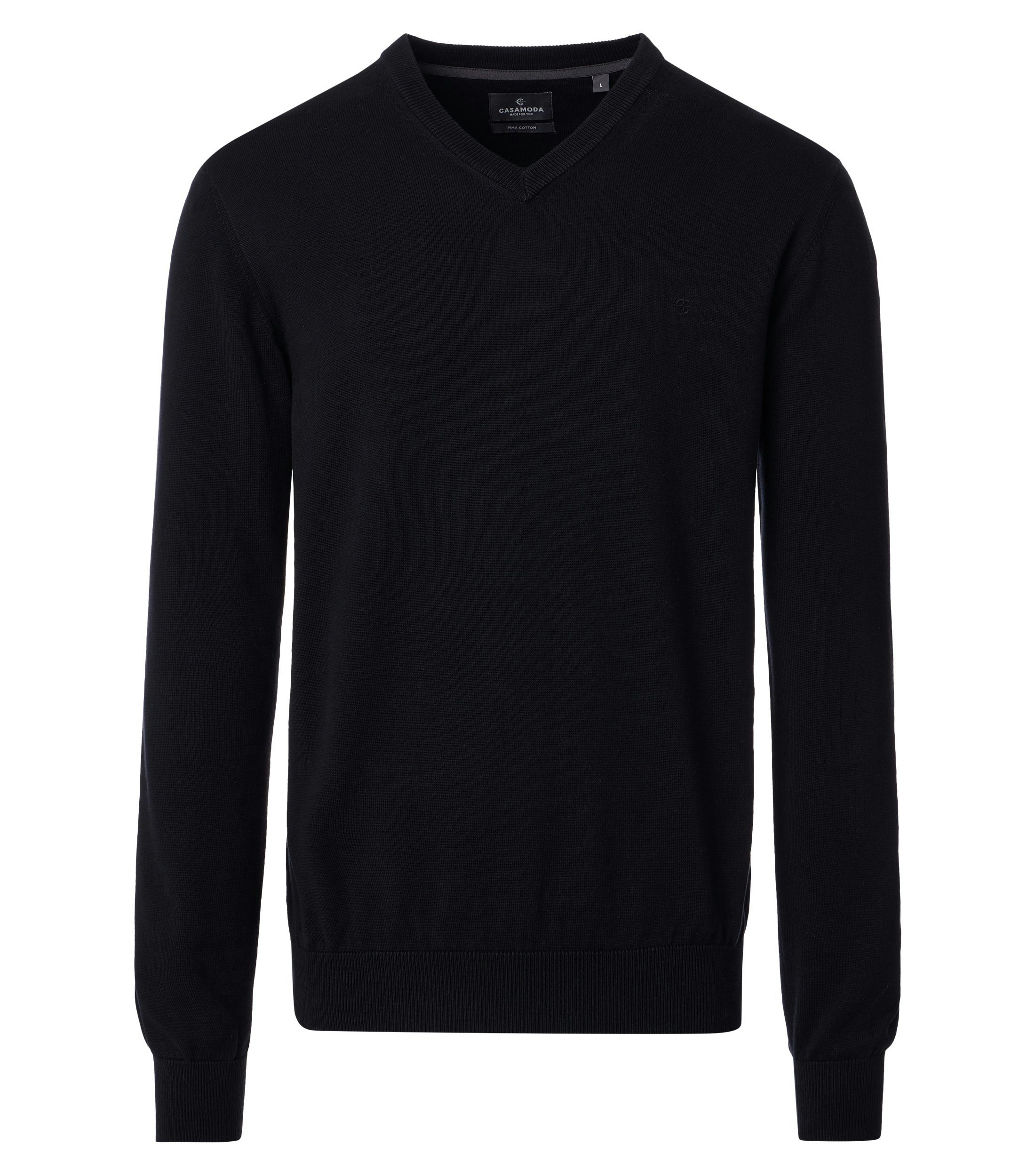 Das Model trägt ein Pullover im uni Muster in der Farbe Schwarz