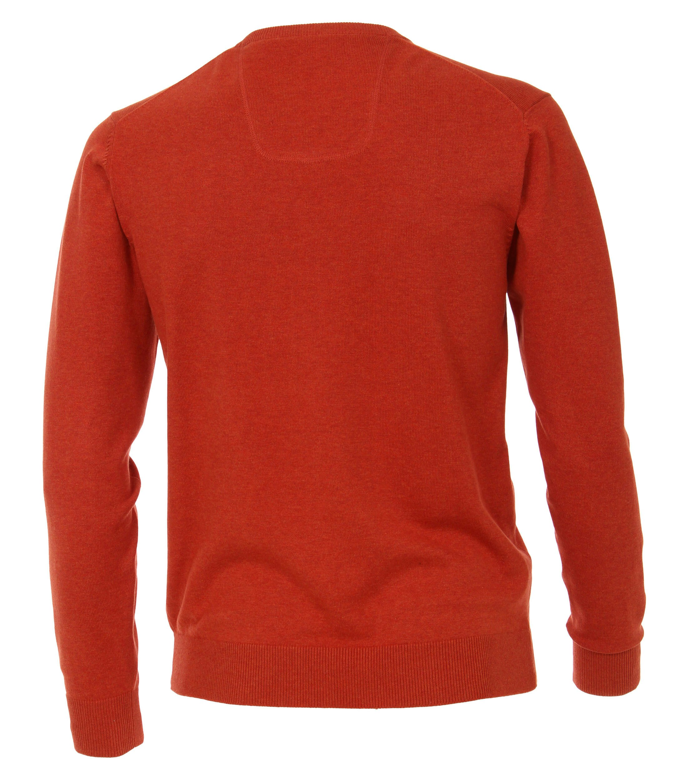 Das Model trägt ein Pullover im uni Muster in der Farbe  Dunkelorange