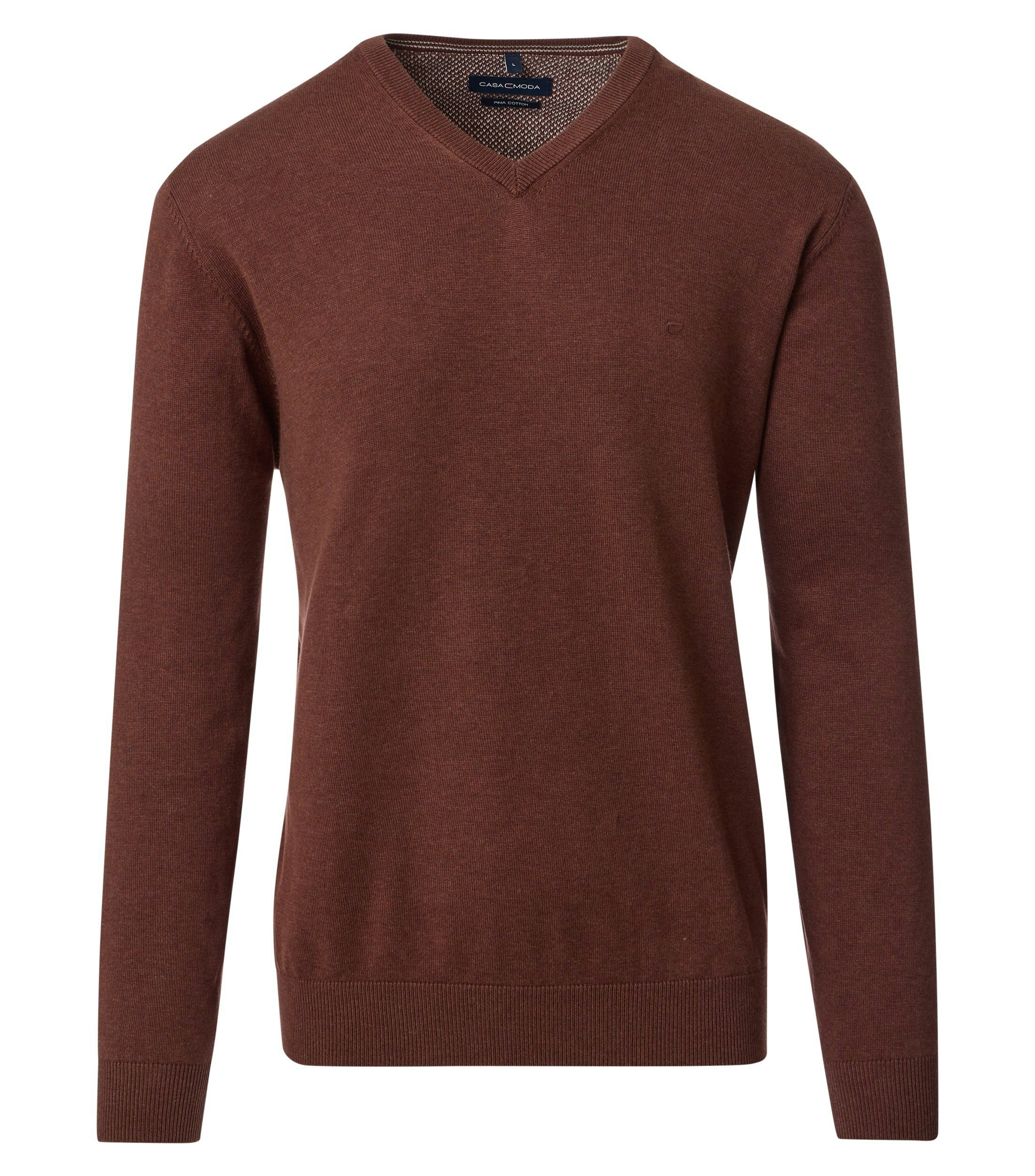 Das Model trägt ein Pullover im uni Muster in der Farbe  Dunkelorange