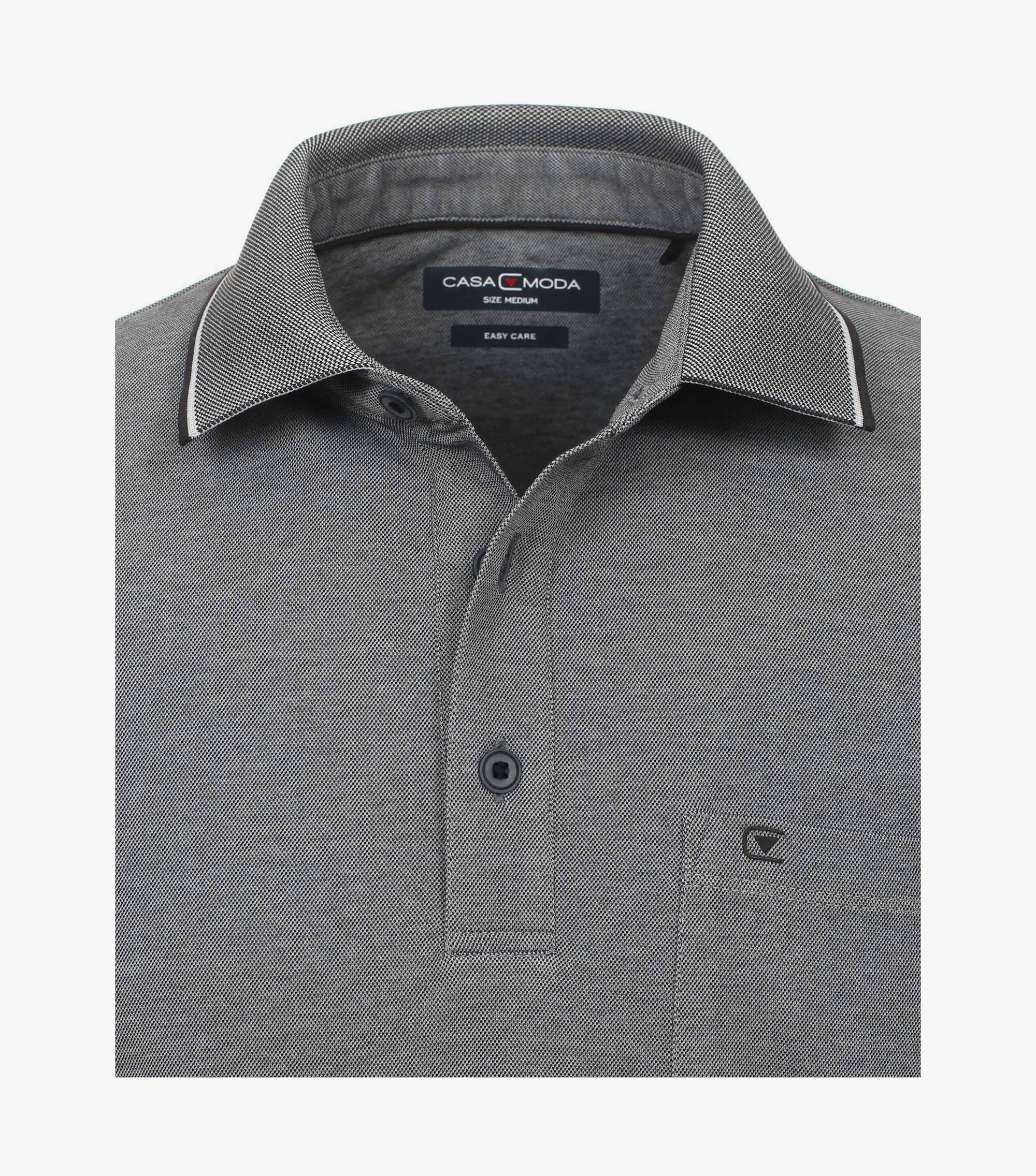 Ein Polo-Shirt im uni Muster in der Farbe Grau