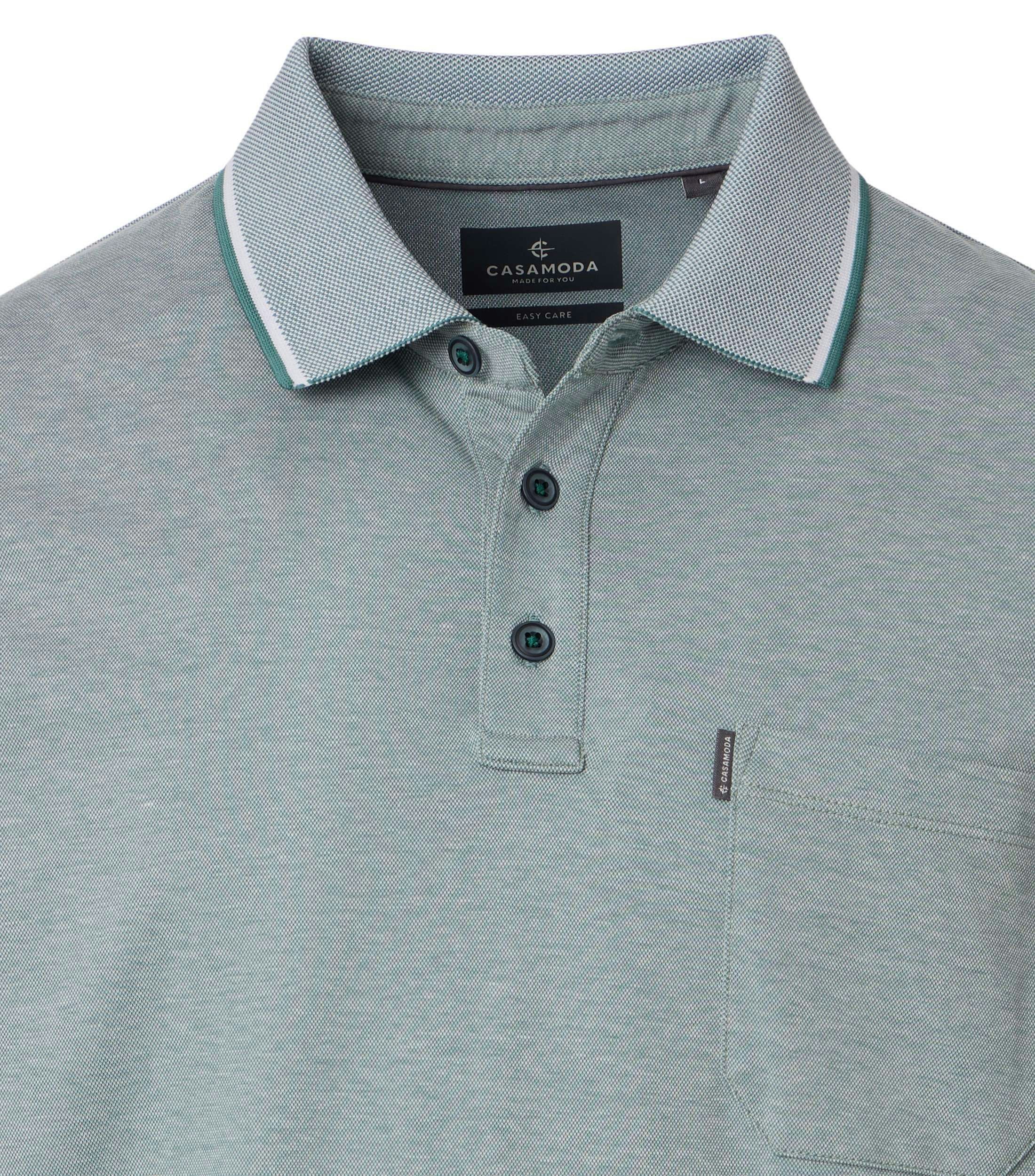 Ein Polo-Shirt im uni Muster in der Farbe Mint