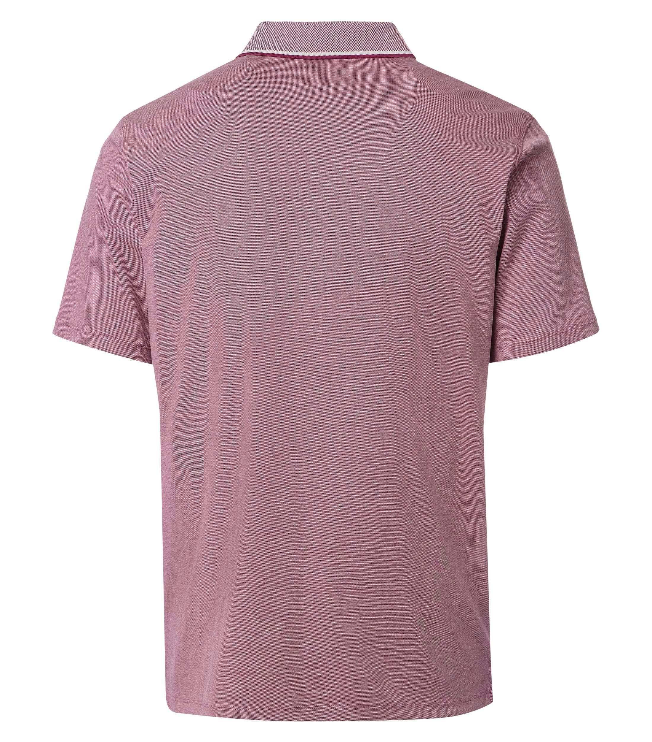 Ein Polo-Shirt im uni Muster in der Farbe Hellrot