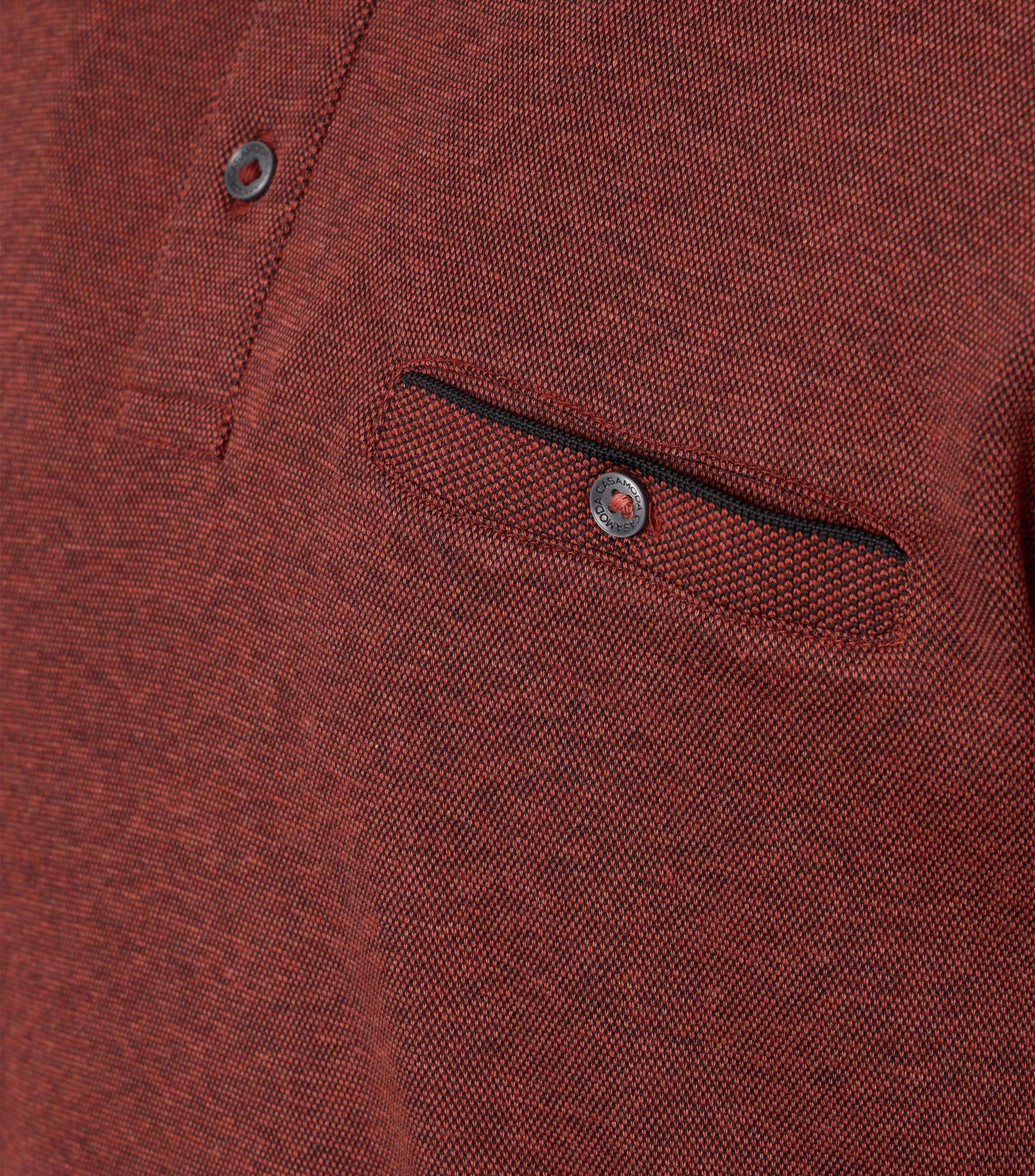 Polo-Shirt im unifarbenen Design in der Farbe Dunkelorange